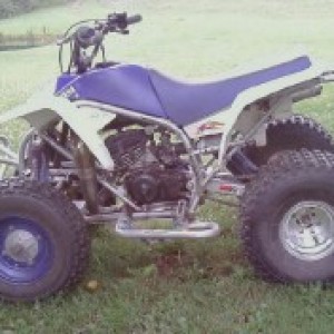 This is my 98 blaster it has a pro circuit pipe kit, 34mm carb, k&n filter pod, head is milled .30, bored .20, wiseco racing piston, port and polished intake and exhaust manifolds, MSR bars, ac grab bar and front bumper, DG nerfs, I got it powder coated yamaha blue with silver a-arms and swing arm, douglas rims on rear, ITP holeshots all around, and custom fabricated engine mounts (broke the welds on the stock one, ripped right off the frame)