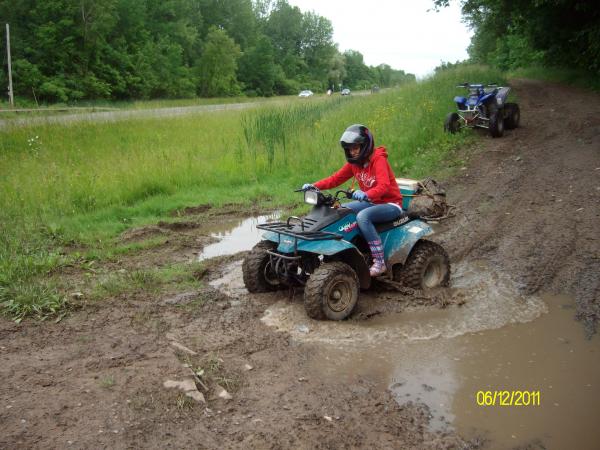 Courtneys first time out.  She heat siezed it  riding around in second gear all day.  Lucky me I found a used motor for $90 and $100 for shipping.  Runs like a dream and she learned how to shift.