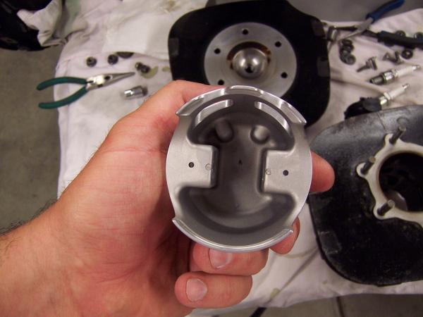 Here's the bottom of the piston...no cleaning...as pulled from the engine.