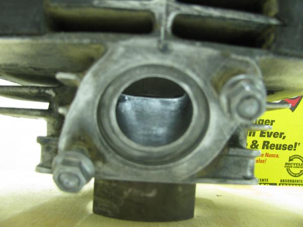 I cleaned up my exhaust port with a dremel and 400 grit sandpaper