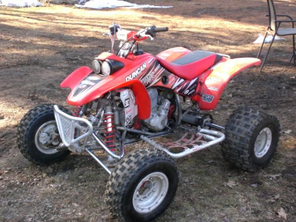 lone star plus 2 a arms, lone star steering stabilizer, lone star axel, lone star steering stem , tag bars , AC racing bumper and nerf s , and 450r shocks